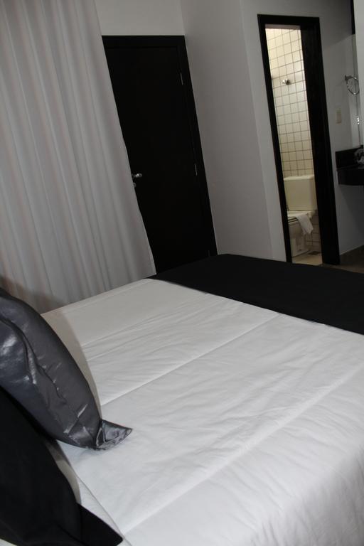 Hotel Dom Henrique Timoteo Bagian luar foto